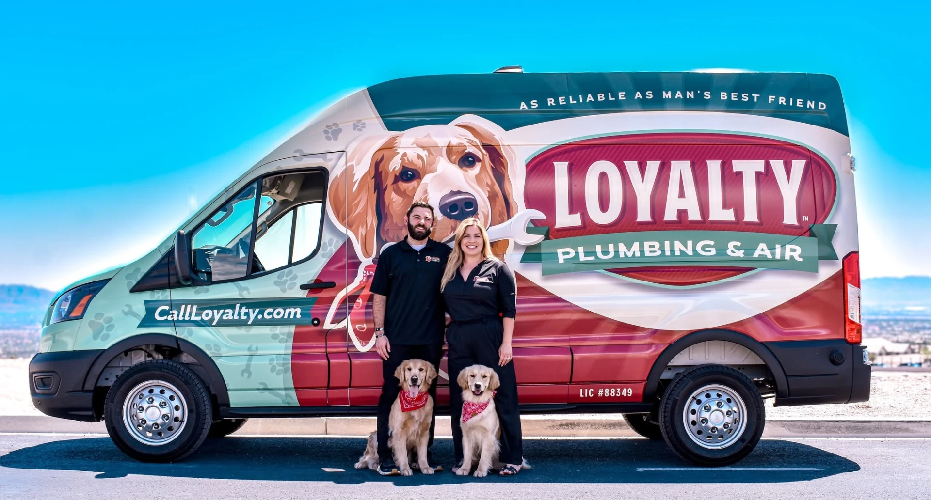 Loyalty Plumbing & Air team with service van and golden retrievers in Las Vegas
